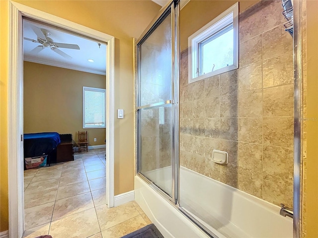 bathroom featuring ceiling fan, ornamental molding, tile patterned floors, and enclosed tub / shower combo