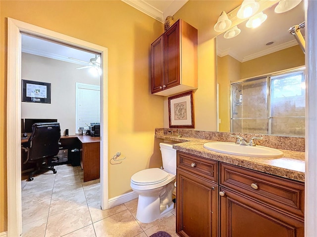 bathroom with toilet, vanity, tile patterned floors, ornamental molding, and an enclosed shower