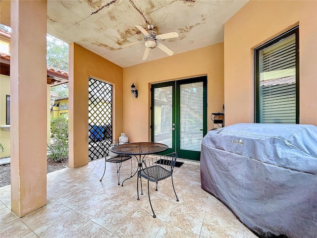 view of patio / terrace featuring ceiling fan