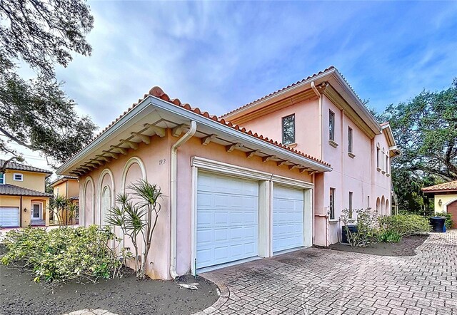 view of home's exterior with a garage