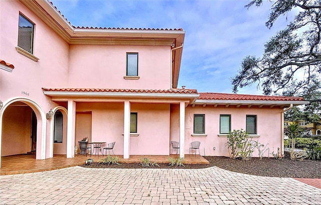 rear view of property with a patio area