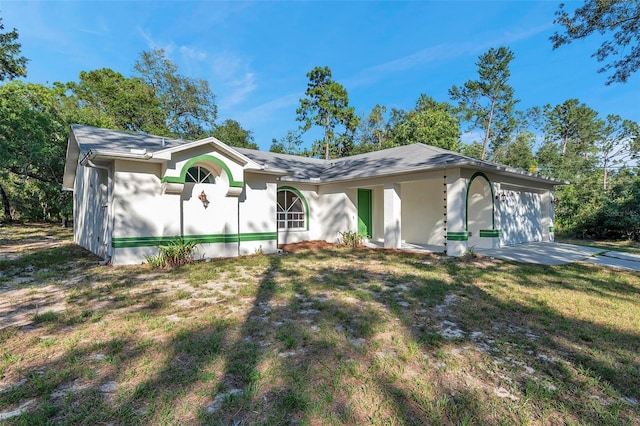 ranch-style house with a front lawn