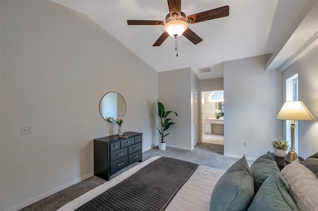 carpeted bedroom with lofted ceiling, ceiling fan, and ensuite bathroom