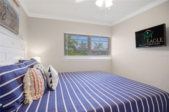 bedroom featuring ceiling fan and ornamental molding