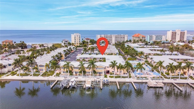 birds eye view of property featuring a water view