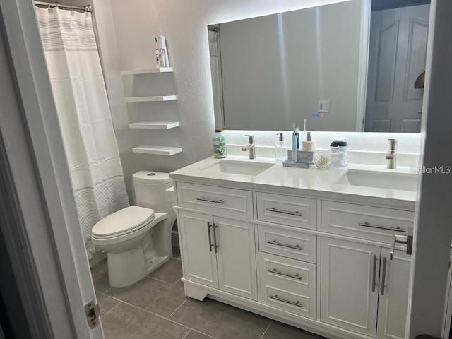 bathroom with tile patterned floors, vanity, toilet, and a shower with shower curtain