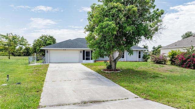 single story home with a front lawn and a garage