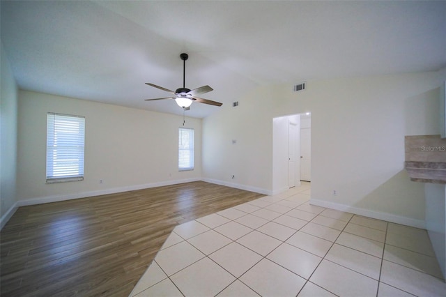 spare room featuring ceiling fan and light hardwood / wood-style floors