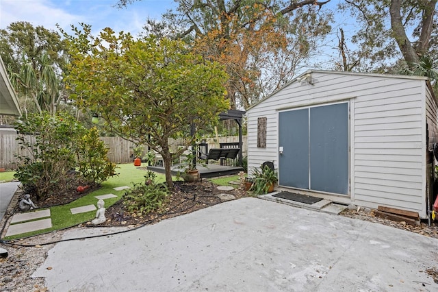 view of outbuilding with a lawn