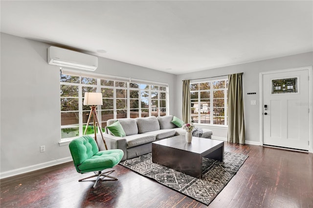 living room with a wall mounted AC and dark wood-type flooring