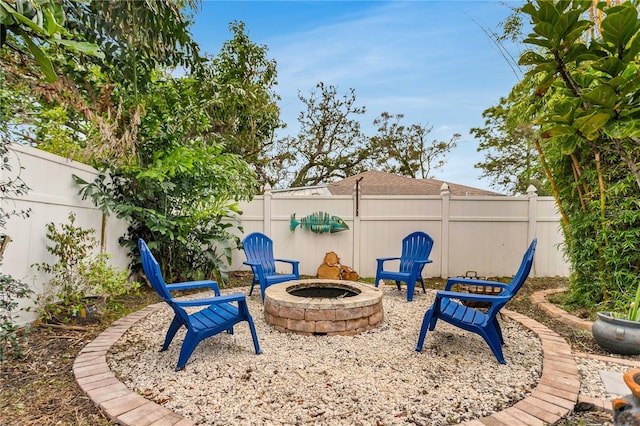 exterior space featuring an outdoor fire pit