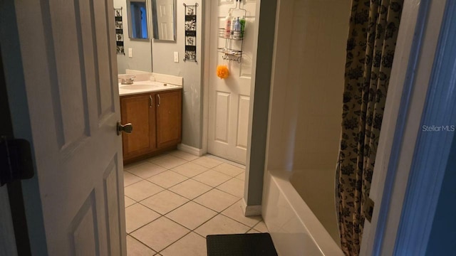 bathroom featuring tile patterned floors and vanity