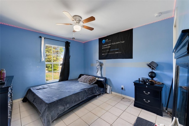 915 Poinsettia Ave, Lehigh Acres, FL 33972 - tiled bedroom featuring baseboards and a ceiling fan