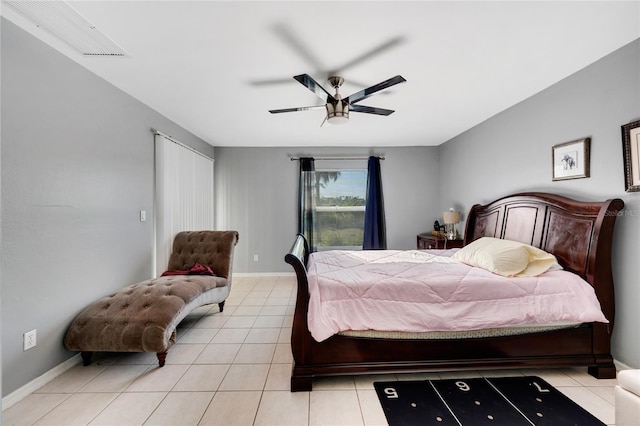 915 Poinsettia Ave, Lehigh Acres, FL 33972 - bedroom featuring light tile patterned floors, baseboards, and a ceiling fan