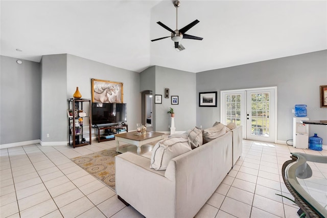 915 Poinsettia Ave, Lehigh Acres, FL 33972 - living area featuring french doors, light tile patterned floors, ceiling fan, and baseboards