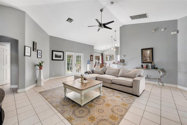 915 Poinsettia Ave, Lehigh Acres, FL 33972 - living room featuring high vaulted ceiling, visible vents, light tile patterned flooring, and ceiling fan