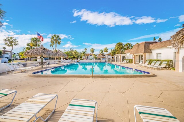 view of swimming pool with a patio area