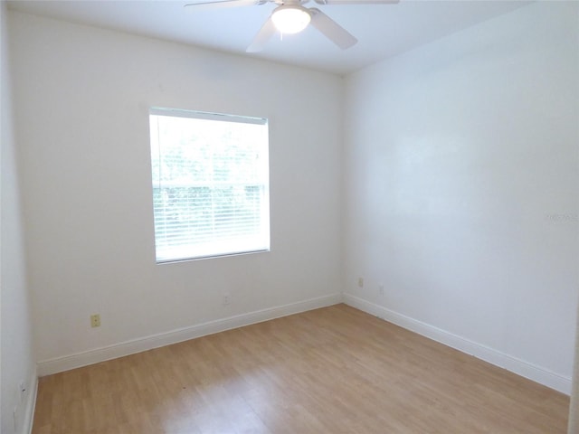 unfurnished room with ceiling fan and light hardwood / wood-style floors