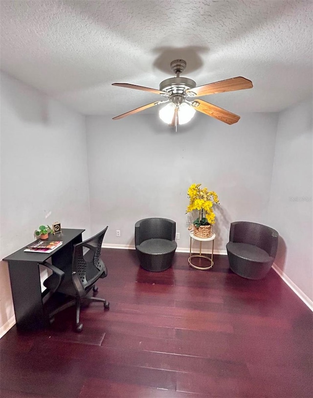 office area with ceiling fan and a textured ceiling