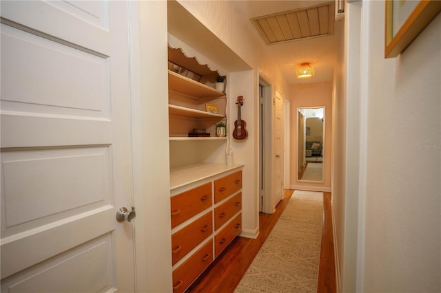 corridor with dark wood-type flooring