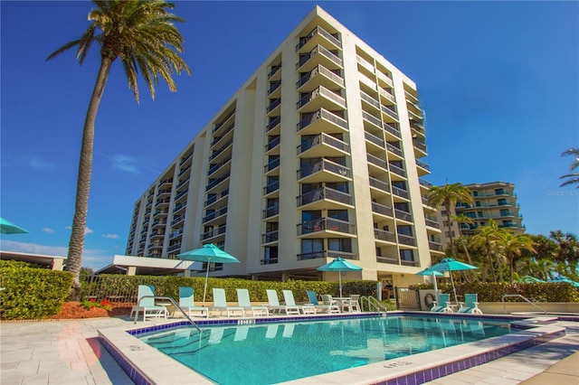 view of swimming pool with a patio