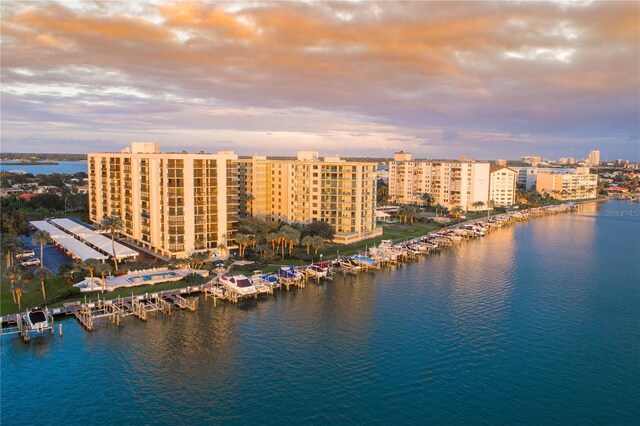 aerial view at dusk with a water view