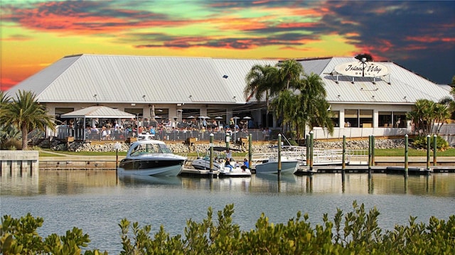 dock area featuring a gazebo and a water view