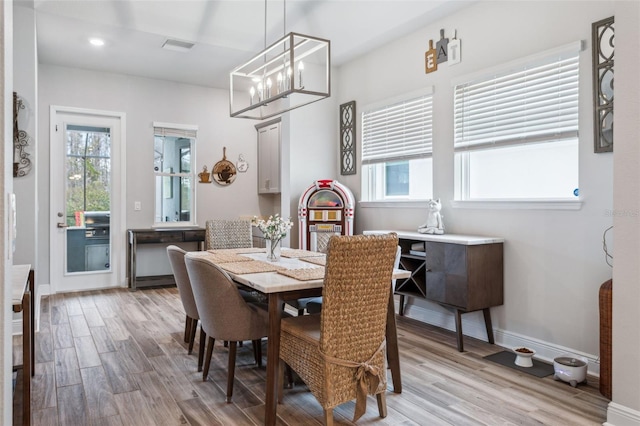 dining room featuring light hardwood / wood-style floors