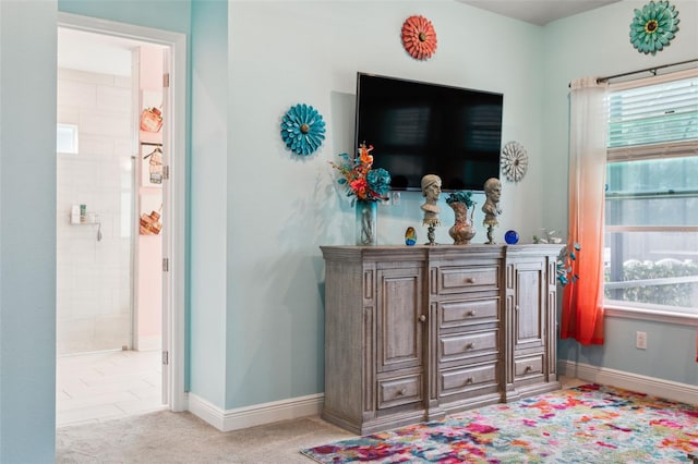 bar featuring light colored carpet