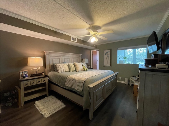 bedroom with crown molding, ceiling fan, dark hardwood / wood-style floors, and a textured ceiling