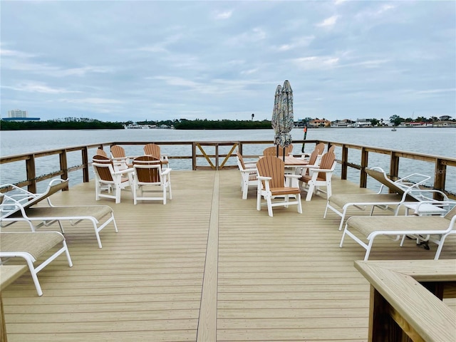 dock area with a water view