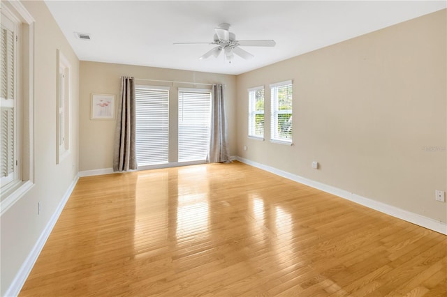 unfurnished room with light hardwood / wood-style floors and ceiling fan