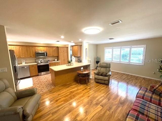 living room featuring light hardwood / wood-style flooring