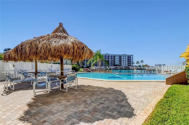 view of swimming pool featuring a patio area