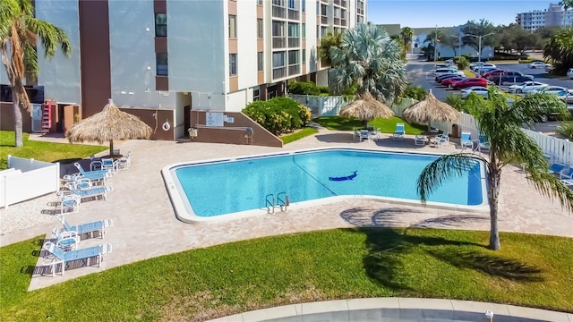 view of swimming pool with a patio area