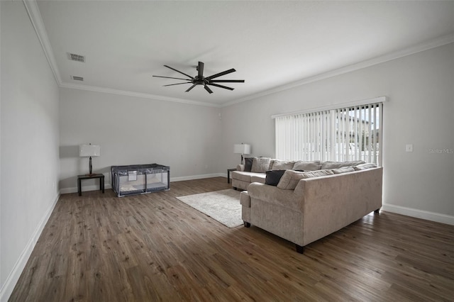 living room featuring ceiling fan, dark hardwood / wood-style floors, and crown molding