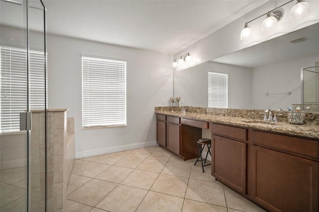 bathroom with plus walk in shower, tile patterned flooring, and vanity