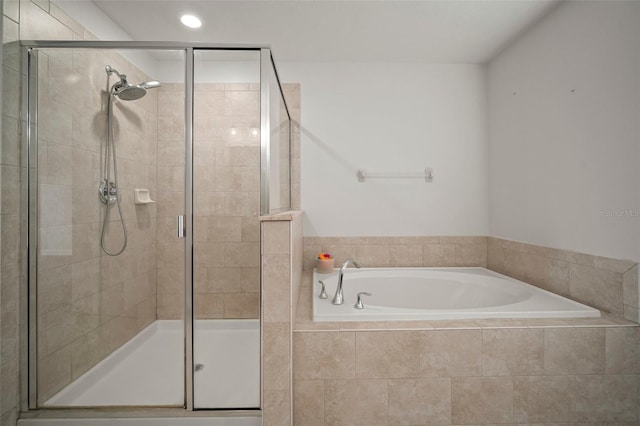 bathroom with independent shower and bath