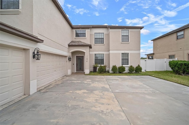 view of front of property with a garage