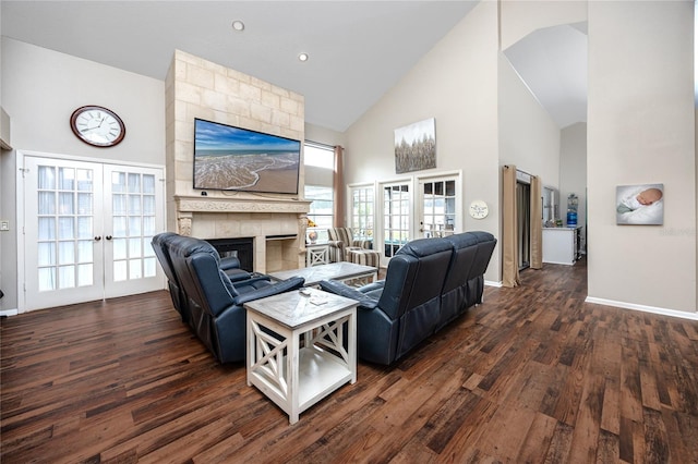 living room with french doors, a fireplace, high vaulted ceiling, and dark wood-type flooring