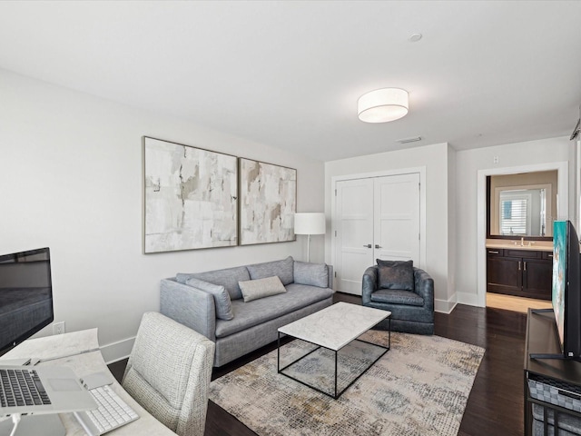 living room featuring dark hardwood / wood-style floors