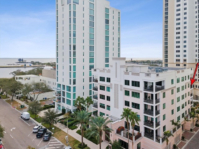 view of building exterior featuring a water view