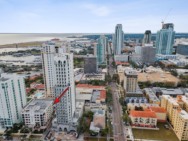 birds eye view of property featuring a water view