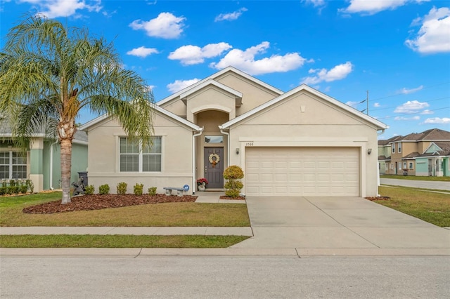 single story home featuring a front yard and a garage