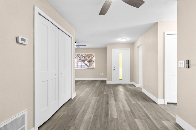 hallway featuring light wood-type flooring