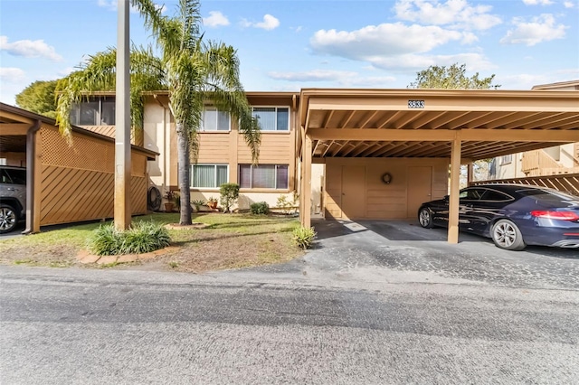 view of property featuring a carport