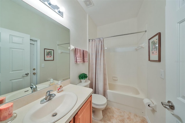 12127 Luftburrow Ln, Hudson, FL 34669 - full bath featuring tile patterned floors, toilet, shower / tub combo with curtain, vanity, and visible vents