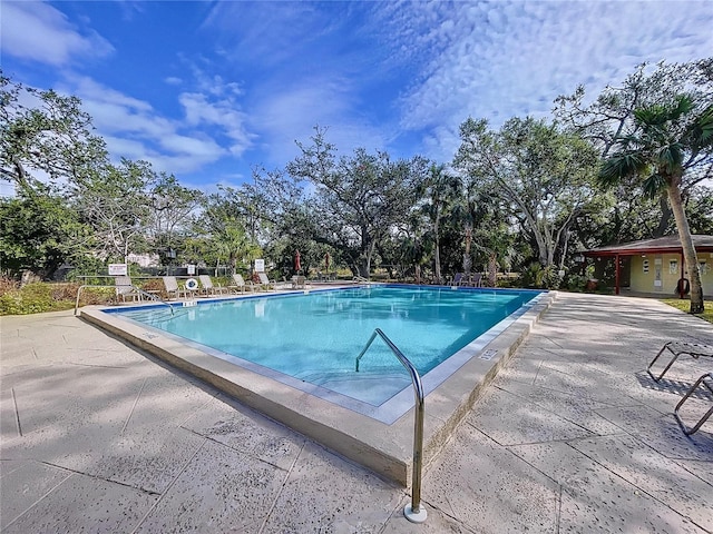 view of pool featuring a patio