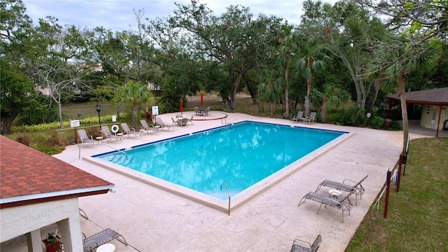 view of pool featuring a patio area