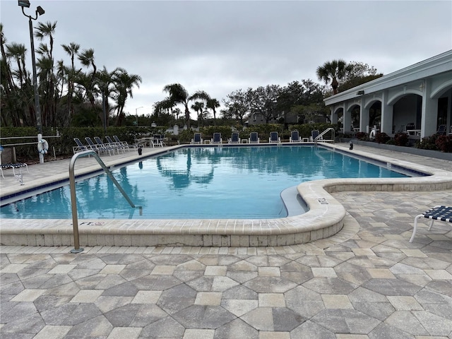 view of swimming pool featuring a patio